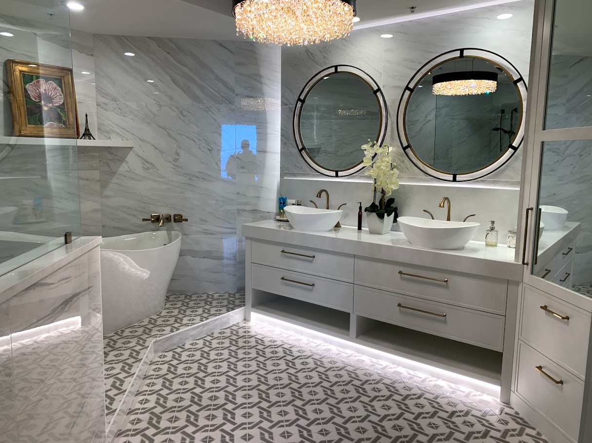 Luxury bathroom with floating vanity and crystal chandelier in Parrish FL